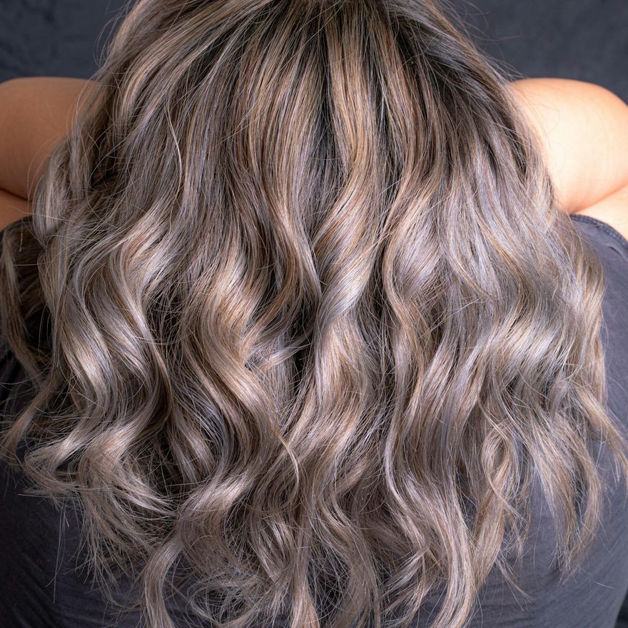 Long silver-ash hair in soft waves
